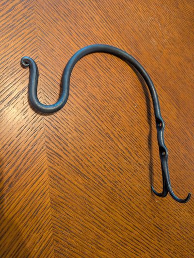 Jusin Clafadoni's quick little project, "friend of mine wanted something to hang a bird feeder from her fence"
