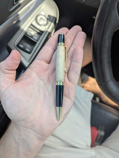Justin Clafardoni's wood turned pen.
